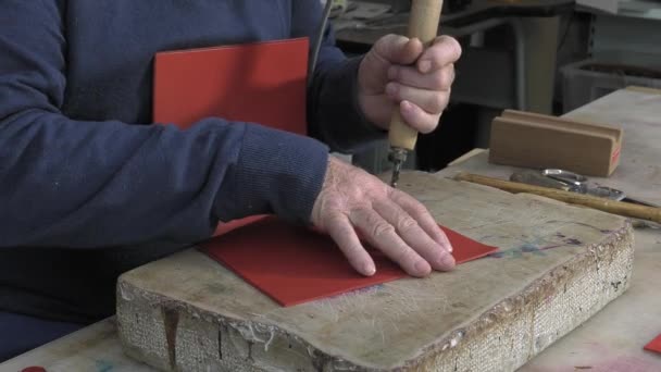 leather goods master craftsman at work - Footage, Video