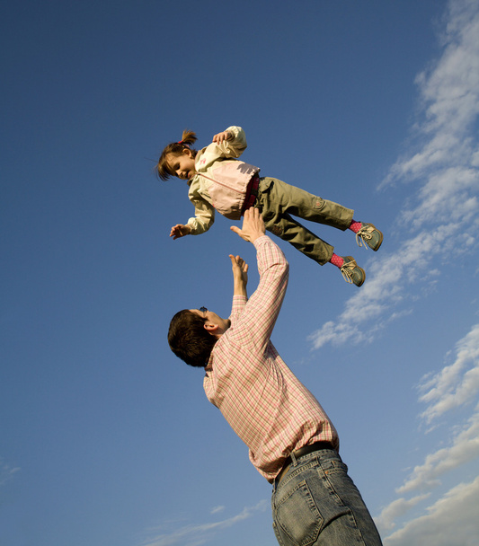 Fun and love of father and child and the sky - Foto, imagen