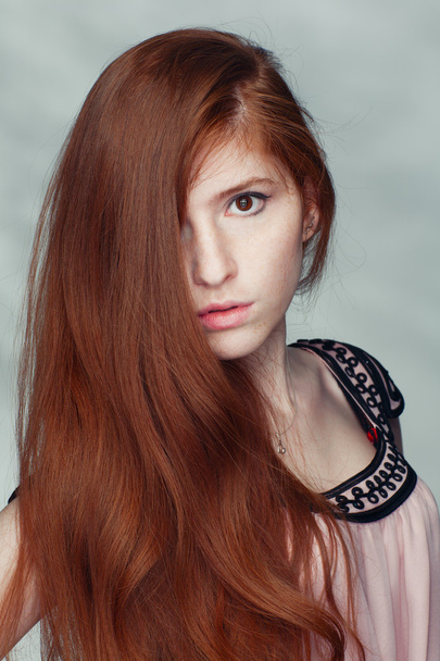 Beautiful redheaded girl - 写真・画像