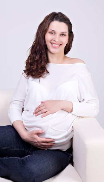 Young attractive pregnant woman - 写真・画像