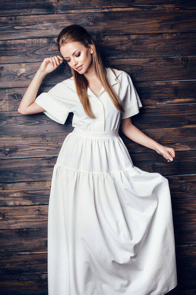 Fashion young beautiful woman in white dress  - Foto, Imagen