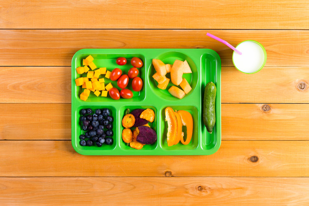 Single green lunch tray of fruit - Φωτογραφία, εικόνα