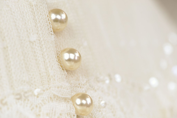 Pearl buttons on a wedding dress - Photo, Image