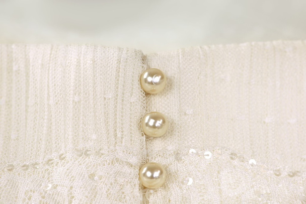 Pearl buttons of ivory wedding dress - Photo, Image