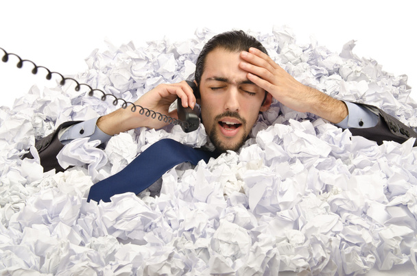 Man with lots of crumpled paper - Photo, Image