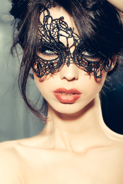 Sensual woman in mask - Фото, изображение
