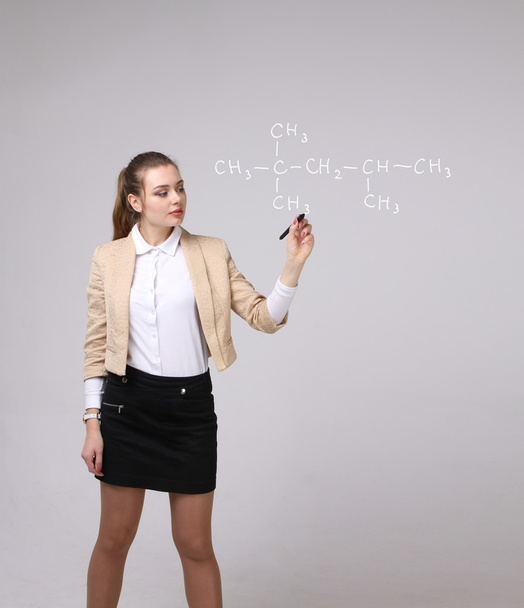 Woman chemist shows a molecular structure - Fotoğraf, Görsel