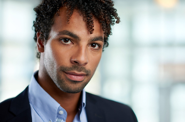 Horizontal headshot of an attractive african american businessman shot with shallow depth field. - Photo, image