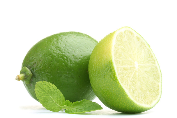 Fresh lime with mint isolated on white - 写真・画像