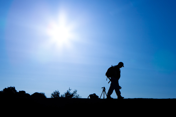 Silhouette of Photographer With Backpack - Photo, Image