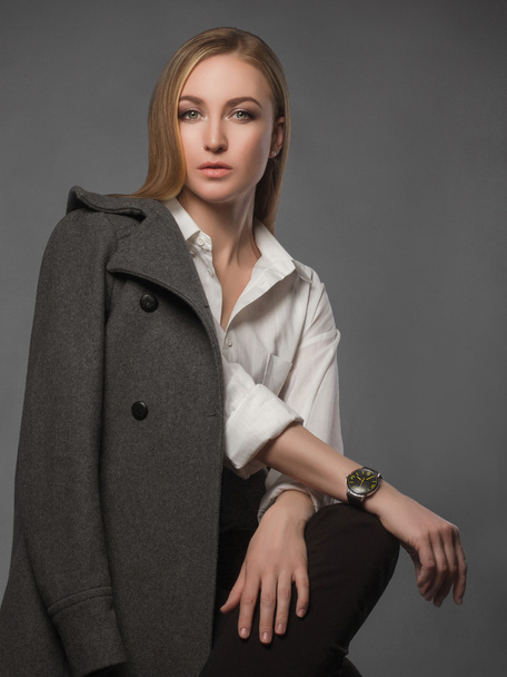 fashionable Beautiful Woman in topcoat - Photo, image
