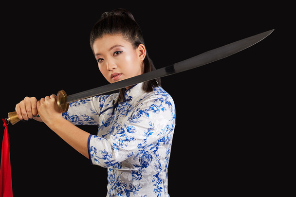 beautiful woman holding sword - Фото, изображение