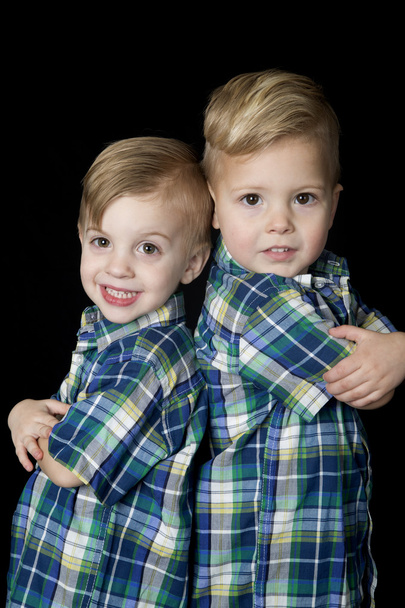 Young blond boys arms folded back to back cute attitude - Fotografie, Obrázek