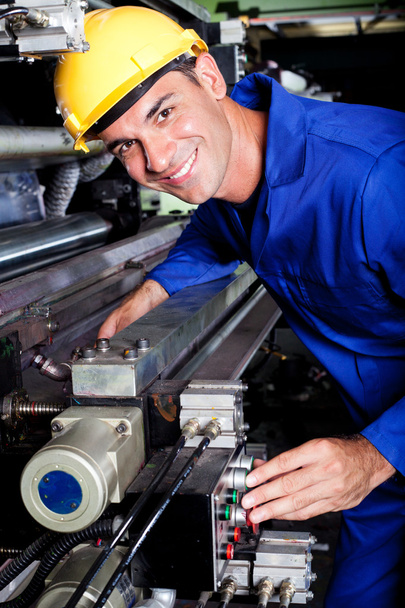 Happy industrial machine operator - Foto, Bild
