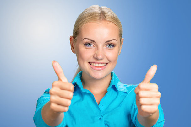 young woman with thumbs up - Foto, immagini