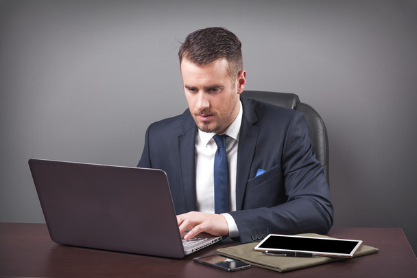 business man working with laptop in office - Photo, Image