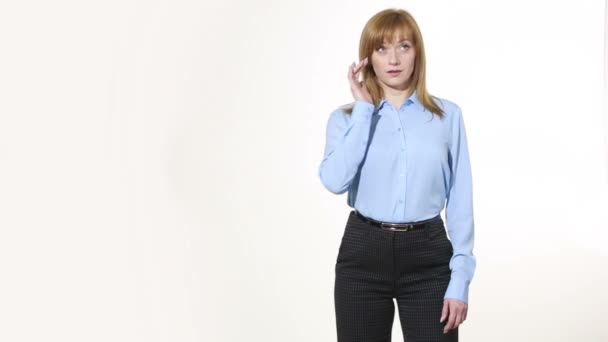 rubs his eyelids. lies gesture. girl in pants and blous.  Isolated on white background. body language. women gestures. nonverbal cues - Záběry, video