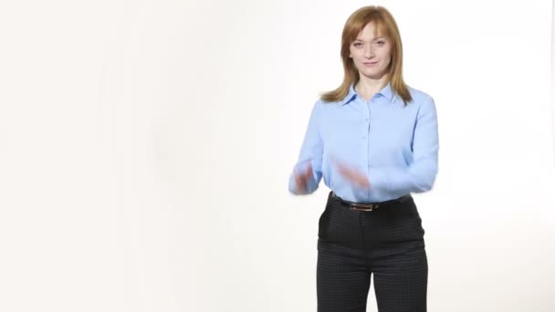 rubbing palms, the hype. girl in pants and blous.  Isolated on white background. body language. women gestures. nonverbal cues - Filmagem, Vídeo