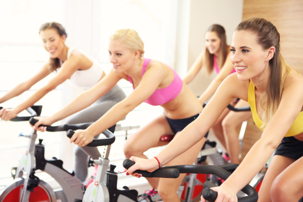 Sporty women on spinning class - Photo, Image