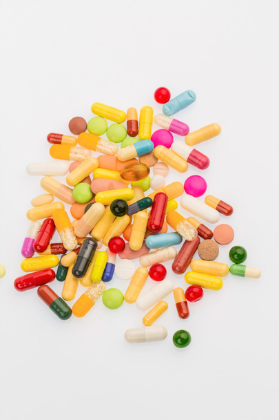 many colorful pills - Foto, afbeelding