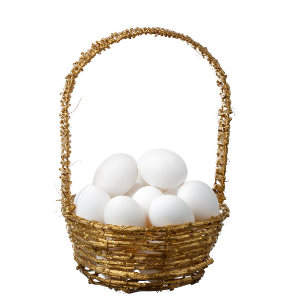 ovos em cesta de ouro
 - Foto, Imagem
