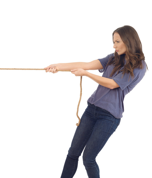 Teenager pulling a rope - Foto, Bild