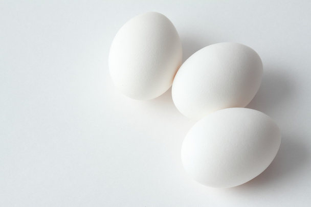 Three eggs on white - Foto, Imagen