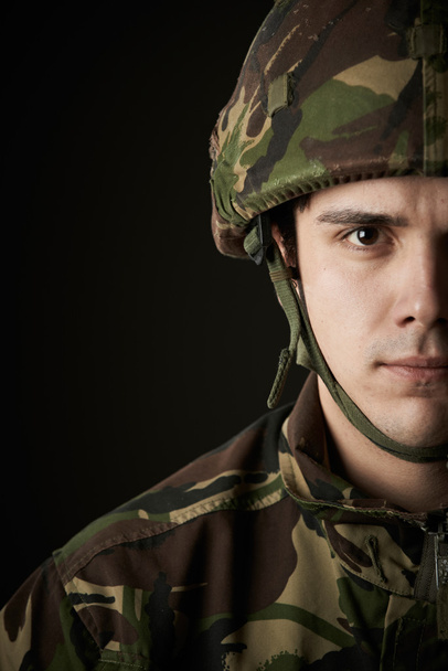 Studio Portrait Of Soldier In Uniform - 写真・画像