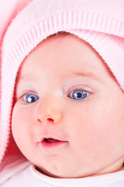 Funny baby girl on pink blanket. - Photo, Image