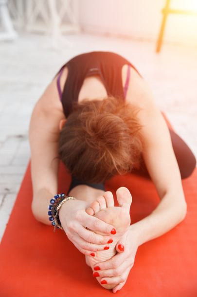 Woman having yoga practice - Fotoğraf, Görsel