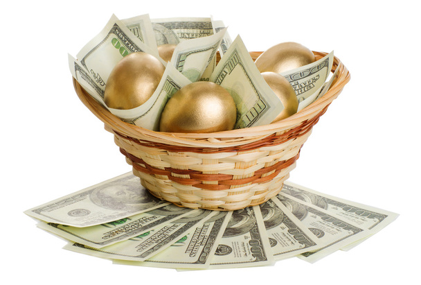 golden eggs and dollars in a basket isolated - Foto, Imagen