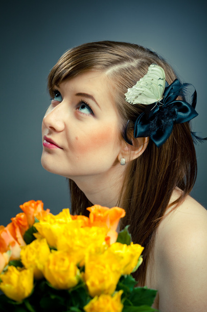 Portrait of beautiful girl and flowers - Фото, зображення