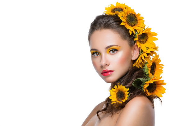 Beautiful girl with flowers in hair - Фото, изображение