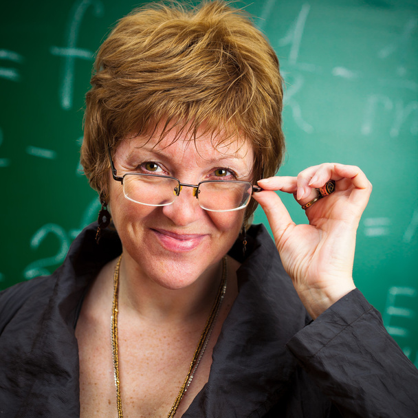 Smiling teacher with glasses - Photo, Image
