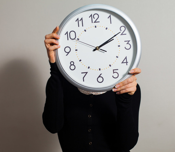 Woman with clock - Photo, Image