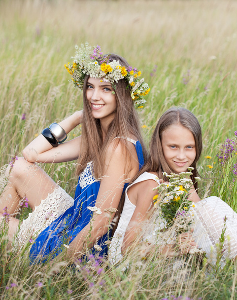 Portrait of two young beautiful cute romantic happy girl wearing - Foto, Bild