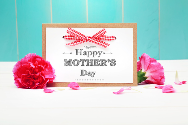Mothers day card with pink carnations - 写真・画像