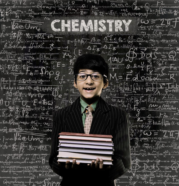 Chemistry. Genius Little Boy Holding Book Wearing Glasses Chalkb - Φωτογραφία, εικόνα