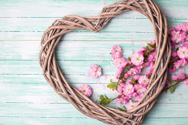 Decorative  heart and pink flowers - Zdjęcie, obraz