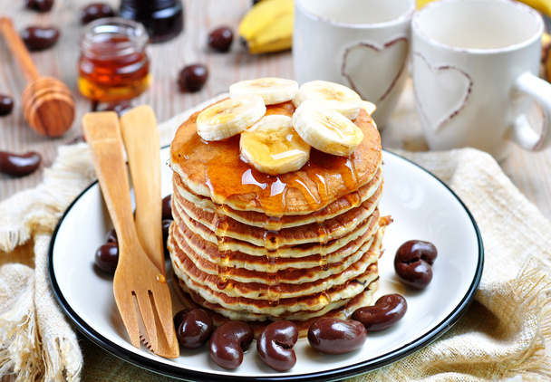 Vegetarian Pancake without eggs with organic agave syrup and bananas - Photo, Image
