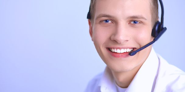 Customer support operator with a headset on white background - Zdjęcie, obraz