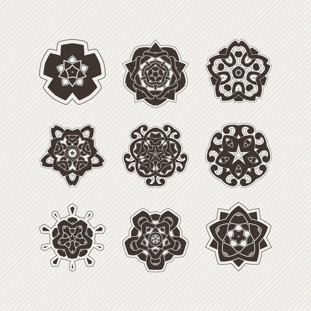 Set of ornate vector mandala symbols. Gothic lace tattoo. Celtic weave with sharp corners. - Vektori, kuva