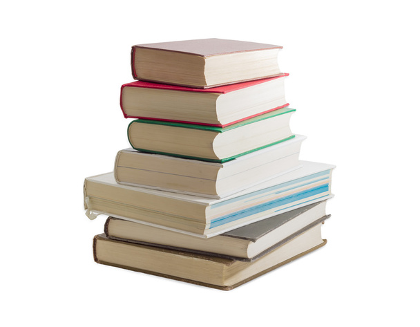 Stack of several different books on a light background - Photo, image