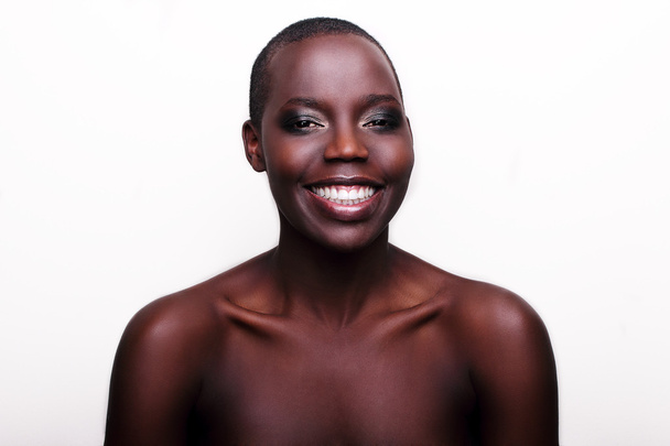 Black African young sexy fashion model studio portrait isolated white black - Foto, Bild