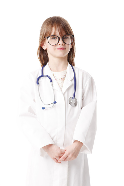 girl dressed up in doctor attire standing - Fotografie, Obrázek