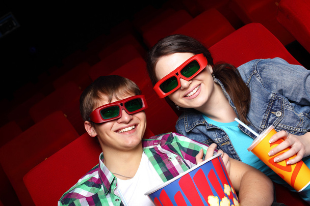 Young couple in cinema watching movie - Fotografie, Obrázek