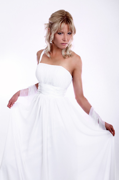 Beauty young blonde bride dressed in elegance white wedding dress - Fotoğraf, Görsel
