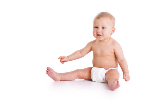 Studio shot of baby in diaper - Foto, imagen