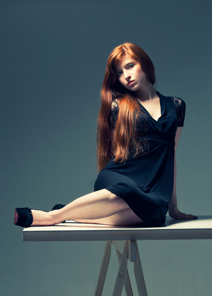 Beautiful redheaded girl - Фото, зображення