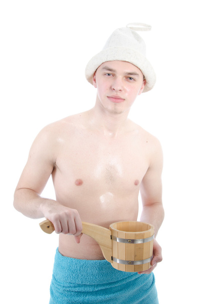 een jonge man in sauna - Foto, afbeelding